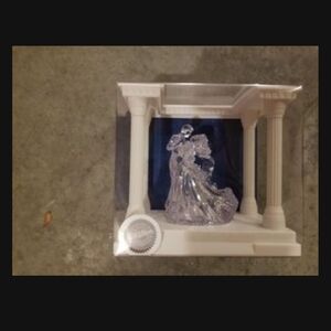 Wedding: cake topper, knife set, and champagne glasses.